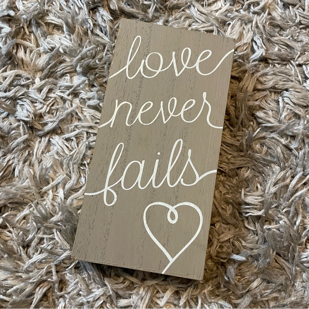 Wooden Block Sign stained with white lettering love never fails heart